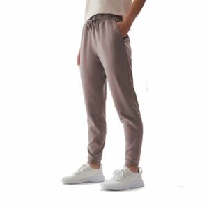 Dámské tepláky 4F-TROUSERS-AW23TTROF507-83S-BEIGE obraz