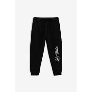 Tepláky Jogger , Barva Černá, s Potiskem Self Made Man obraz