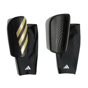 Adidas TIRO SG COM BLACK/GOLDMT/WHITE fotbalové chrániče - Velikost L obraz