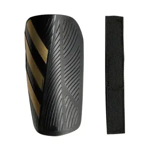 Adidas TIRO SG EU CLB BLACK/GOLDMT/WHITE fotbalové chrániče - Velikost M obraz
