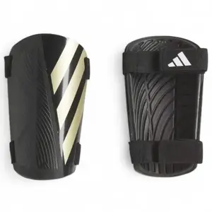 Adidas TIRO SG TRN BLACK/GOLDMT/WHITE fotbalové chrániče - Velikost S obraz