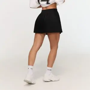 GymBeam Dámská sukně Varsity Black - XS obraz