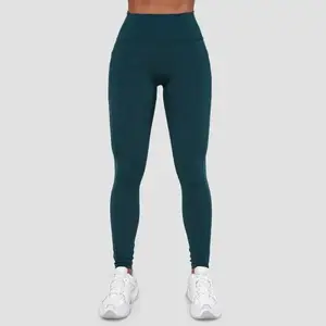 GymBeam Dámské legíny Ignite Dark Green POUZE M (VÝPRODEJ) obraz