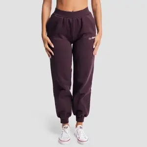 GymBeam Dámské tepláky GymBabe Eclipse - XS obraz