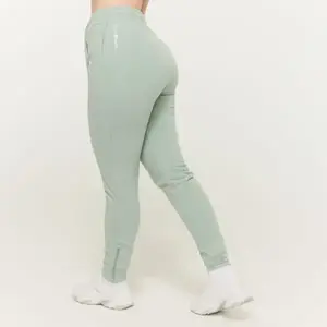 GymBeam Dámské tepláky Limitless Eucalypt - XL obraz