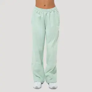 GymBeam Dámské tepláky Mochi Green - XS obraz