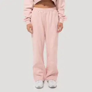 GymBeam Dámské tepláky Mochi Pink - XS obraz