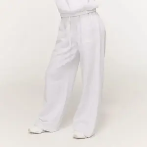 GymBeam Dámské tepláky Varsity Grey - L obraz