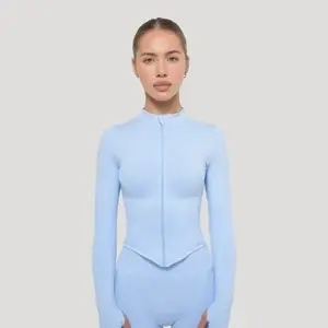 GymBeam Dámský sportovní top Luma Baby Blue - L obraz