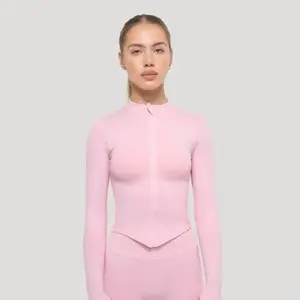 GymBeam Dámský sportovní top Luma Baby Pink - S obraz