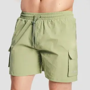 GymBeam Men‘s Swim Cargo Shorts Olive - XXL obraz