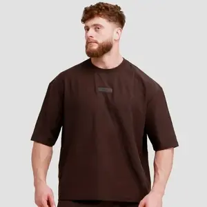 GymBeam Oversized Unstoppable T-shirt Brown - XXL obraz
