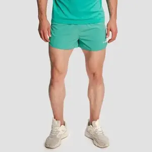 GymBeam Pánské běžecké šortky Pulse X Green - XL obraz
