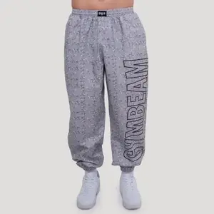 GymBeam Pumper Persistence šedé kalhoty - XL obraz