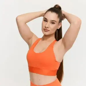 GymBeam Sportovní podprsenka Limitless Orange - XXL obraz