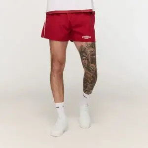GymBeam Sportovní šortky Varsity Red - XL obraz