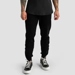 GymBeam Tepláky Limitless Black - XXL obraz