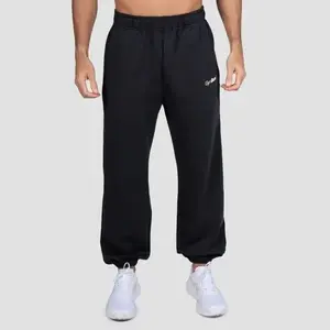GymBeam Tepláky Relay Black - XXL obraz