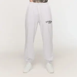 GymBeam Tepláky Varsity Grey - XXXL obraz