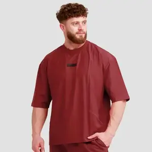 GymBeam Unstoppable Red pánské oversized tričko - M obraz